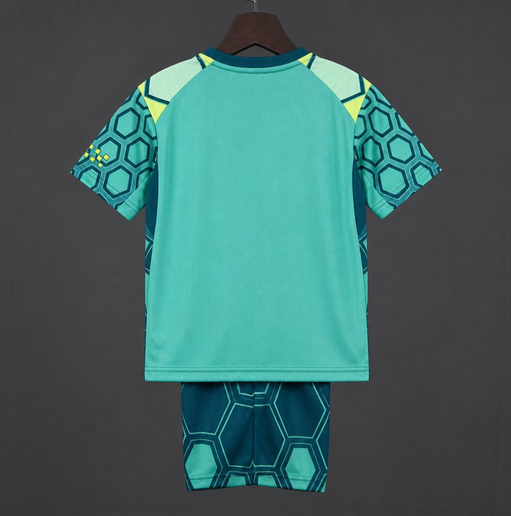 26/27 Kids Manchester City Vibrant Green Goalkeeper Jersey With Dark Blue Geometric Pattern.