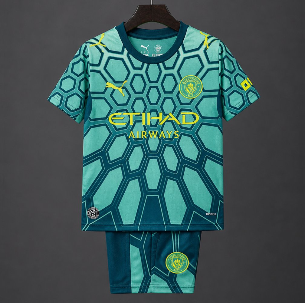 26/27 Kids Manchester City Vibrant Green Goalkeeper Jersey With Dark Blue Geometric Pattern.